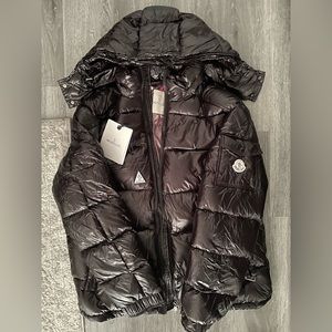 Never Used Moncler maya size 4 Moncler tag scans.           Cop up